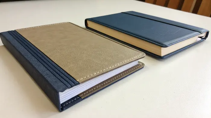 Side-by-side comparison of a hardcover and softcover book