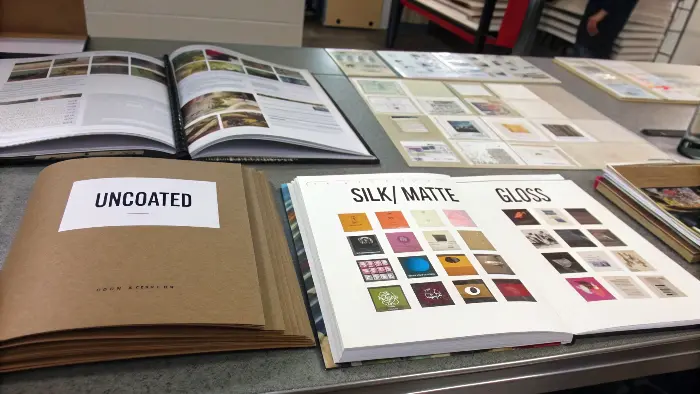 Close-up of coated vs uncoated paper texture